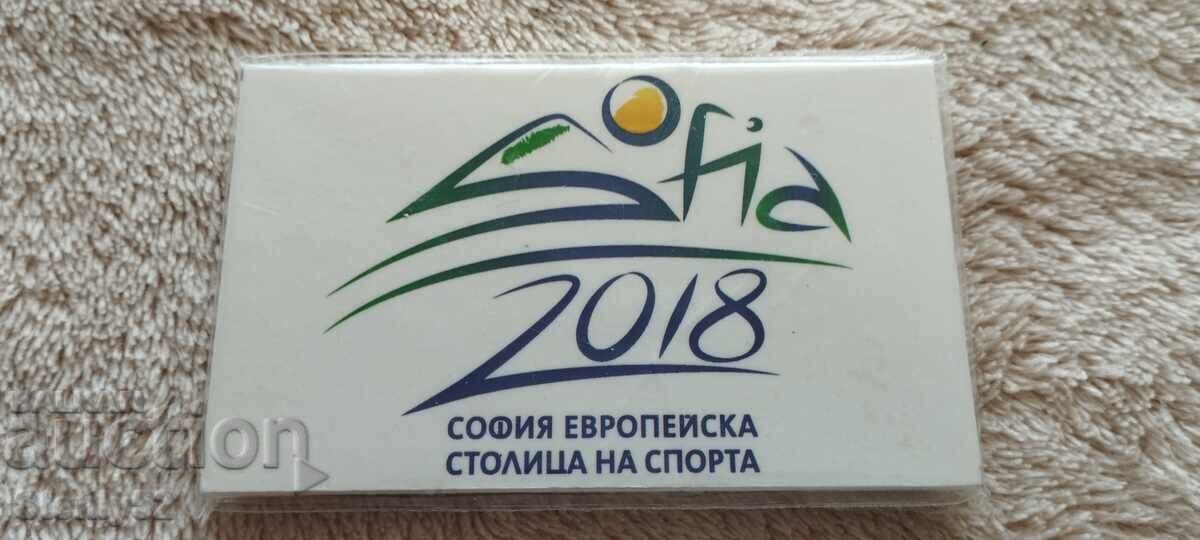 Souvenir with a fridge magnet, made of plastic