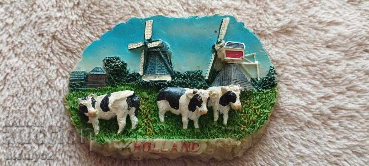 Refrigerator magnet souvenir. Embossed