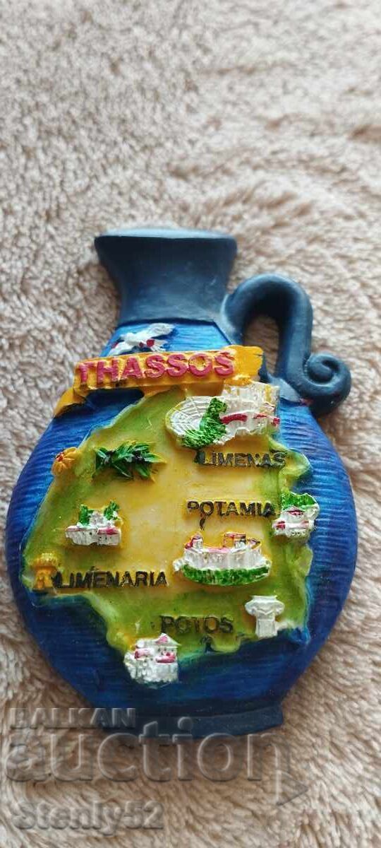 Refrigerator magnet souvenir. Embossed