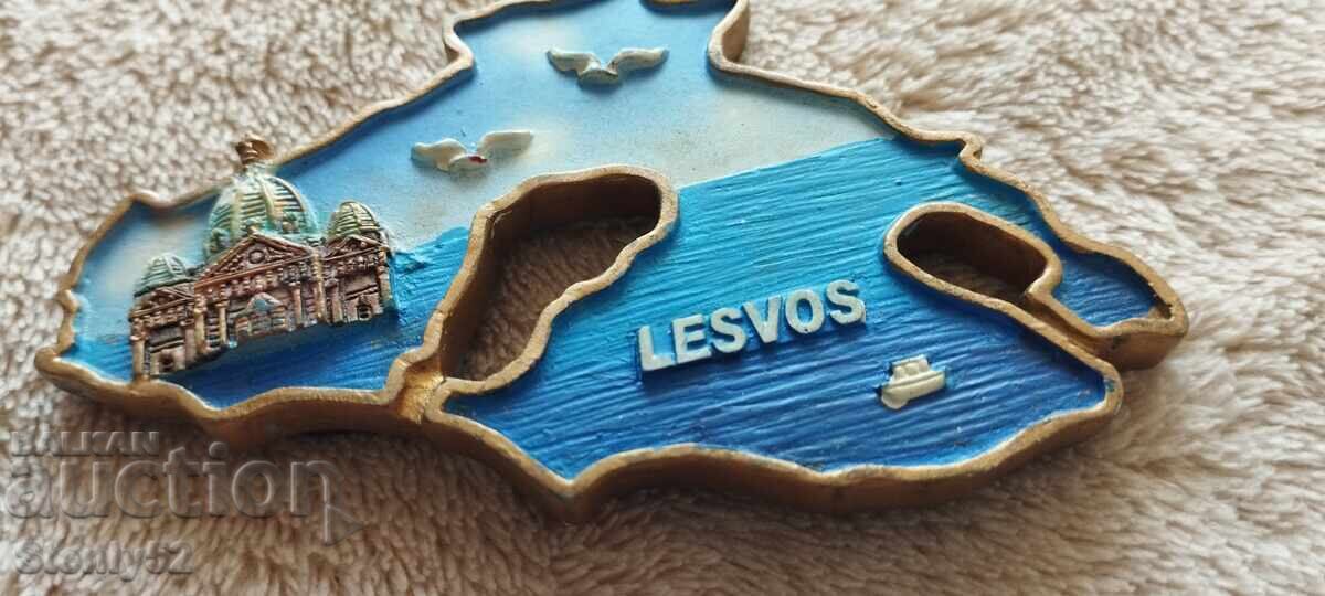 Refrigerator magnet souvenir. Embossed