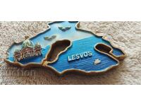 Refrigerator magnet souvenir. Embossed