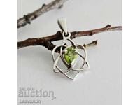 Silver pendant with Period