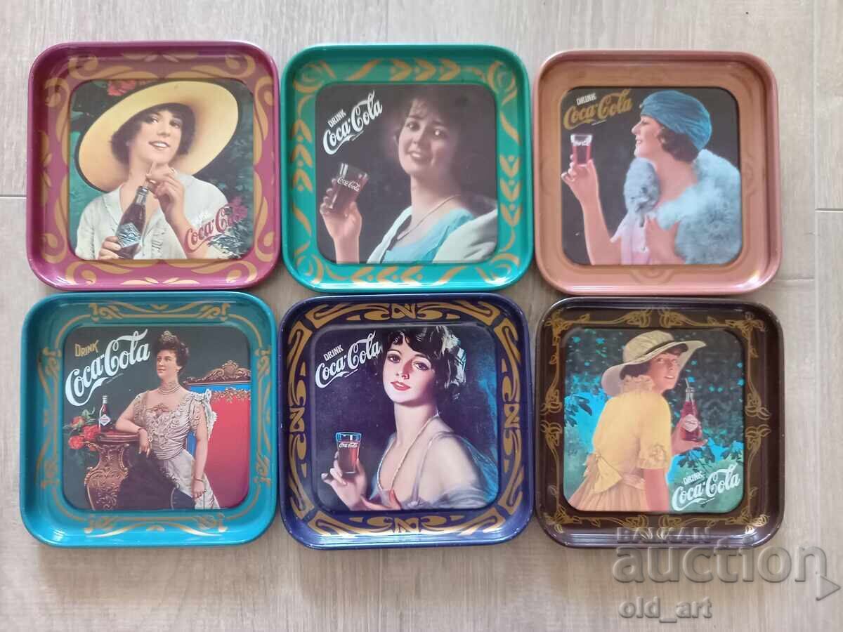 Suporturi de pahare metalice de colecție Coca Cola cu preț 50.00 BGN | € 25.56