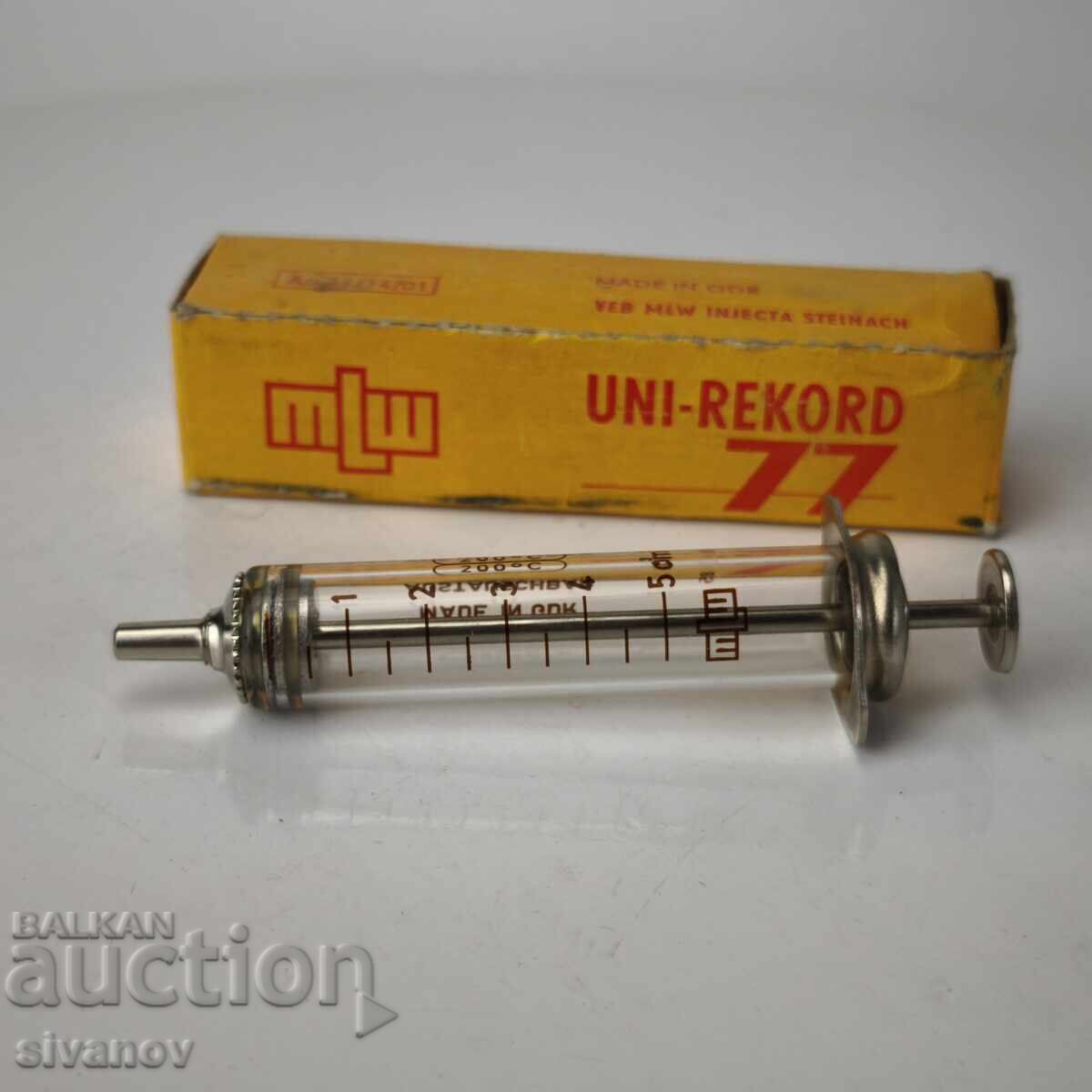 Seringă veche de sticlă 5cc MLW Injecta Steinach #6088 cu preț 19.99 BGN | € 10.22 Seringă veche de sticlă 5cc MLW Injecta Steinach #6088 cu preț 19.99 BGN | € 10.22