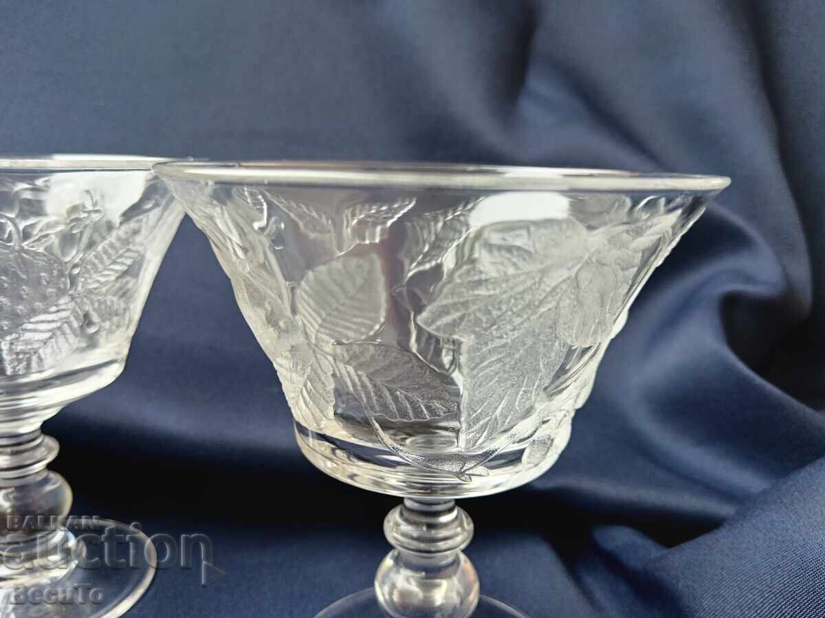 Pressed glass carafe and glasses on a stand with embossed fruit with price 42.00 BGN | € 21.47 Pressed glass carafe and glasses on a stand with embossed fruit with price 42.00 BGN | € 21.47