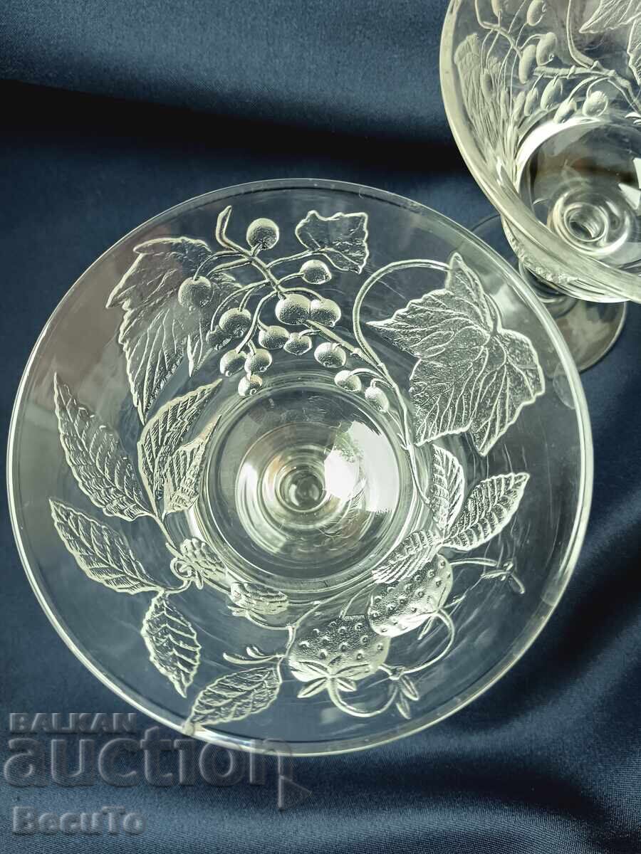 Delivery of Pressed glass carafe and glasses on a stand with embossed fruit Delivery of Pressed glass carafe and glasses on a stand with embossed fruit