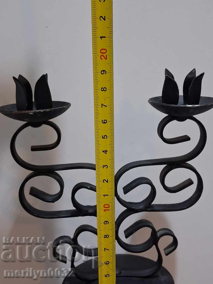 Auction  Socialist wrought iron candlestick