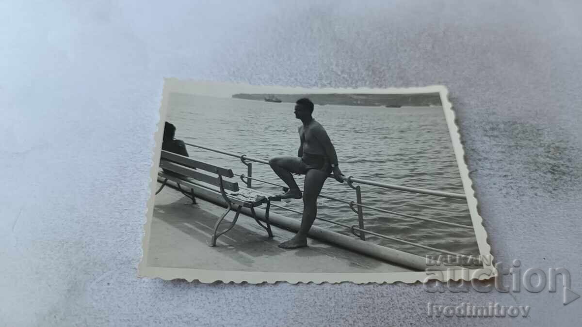 Photo of a Man on the Pier