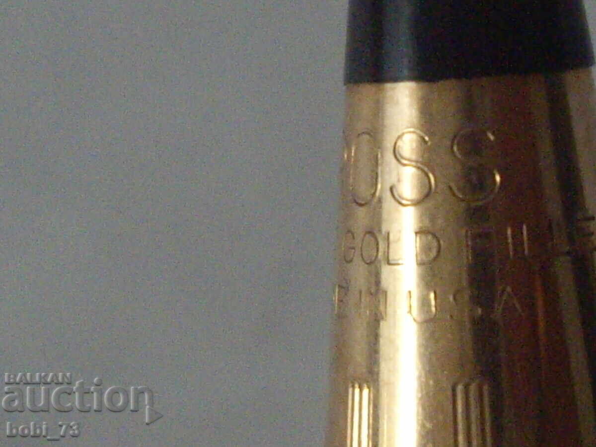 Auction  Old gilt pen.