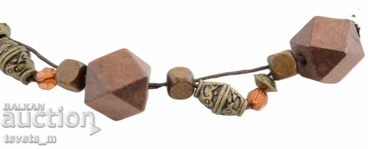 Necklace with wooden elements and beads with price 8.00 BGN | € 4.09