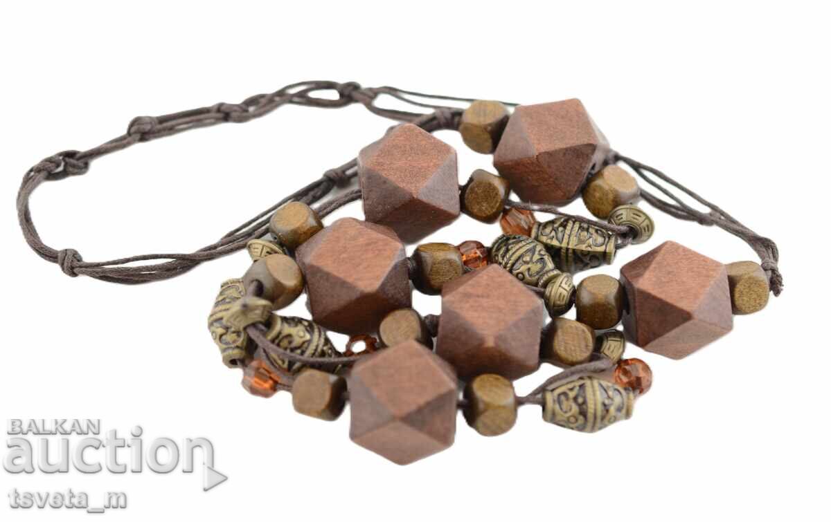 Auction  Necklace with wooden elements and beads