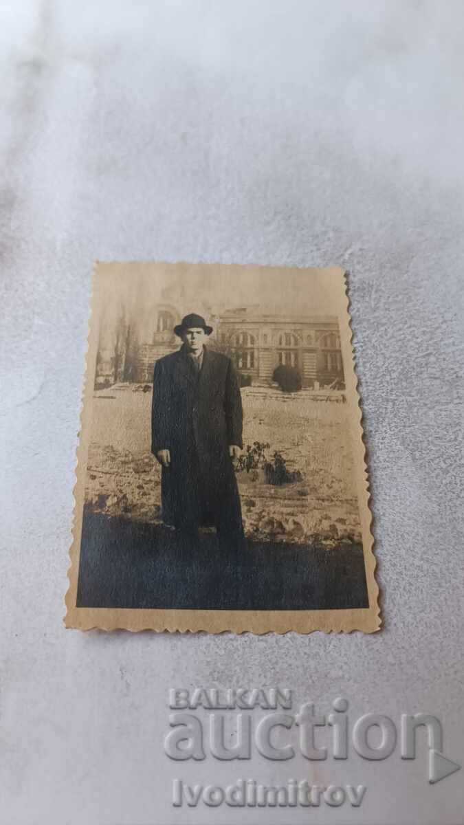 Photo Sofia Man in front of the Central Bathhouse in winter