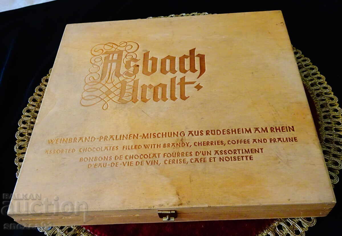 Wooden box of chocolate candies Asbach Uralt