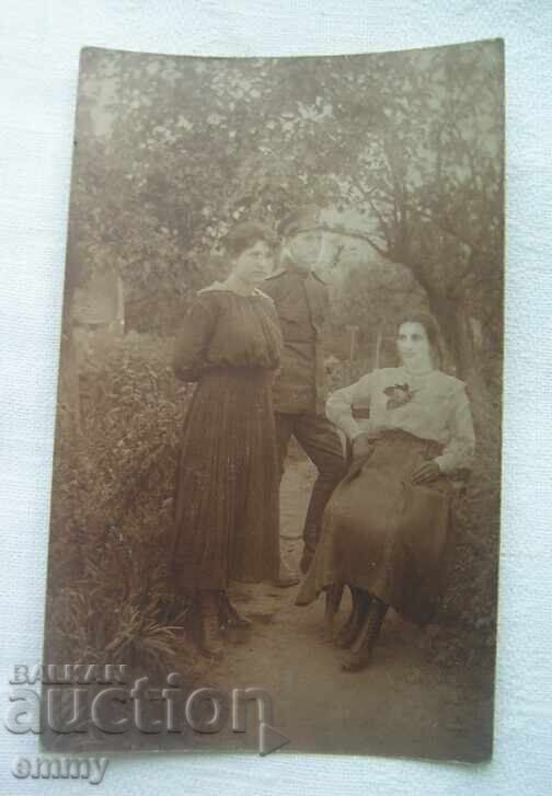 Old photo from 1918, Ihtiman - soldier and two women, girls