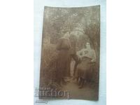 Old photo from 1918, Ihtiman - soldier and two women, girls