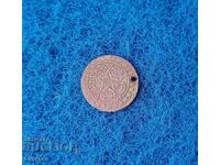 Стара монета ползвана за накит