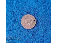 Παλαιό νόμισμα που χρησιμοποιείται ως κόσμημα