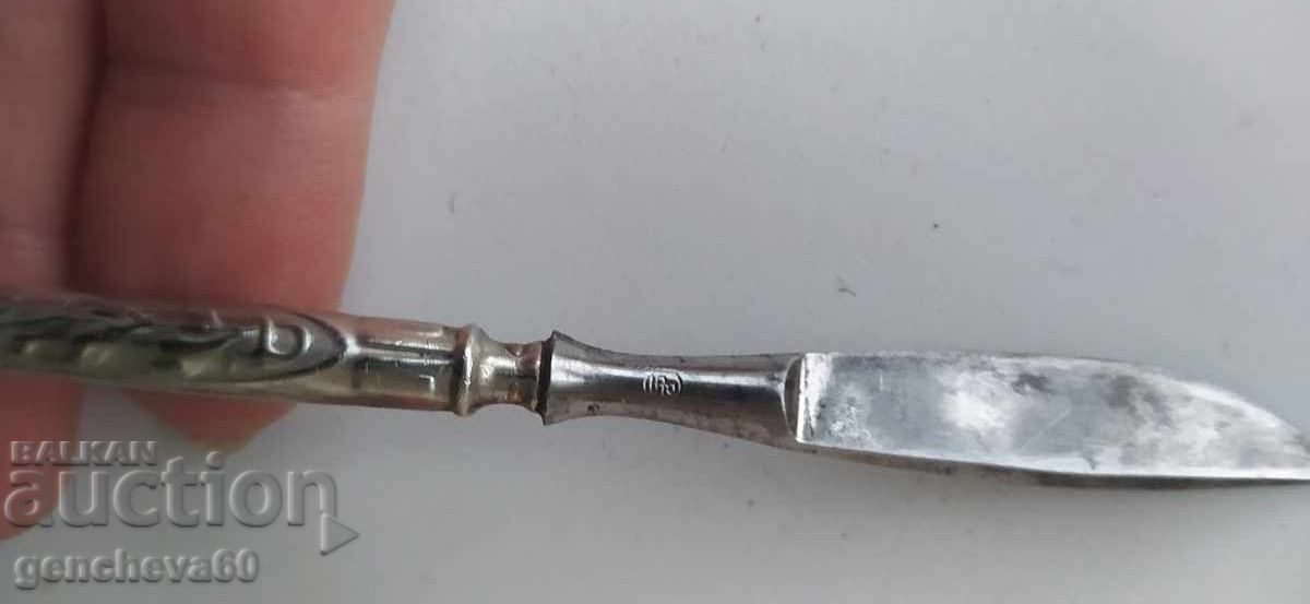 Auction  Antique scalpel, silver handle with ornaments