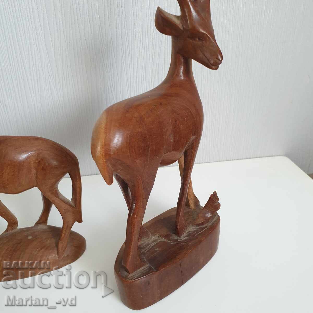 Auction Old wooden deer figures Auction Old wooden deer figures