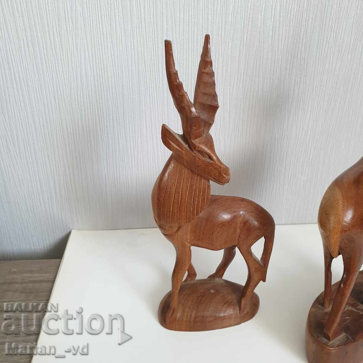 Delivery of Old wooden deer figures Delivery of Old wooden deer figures