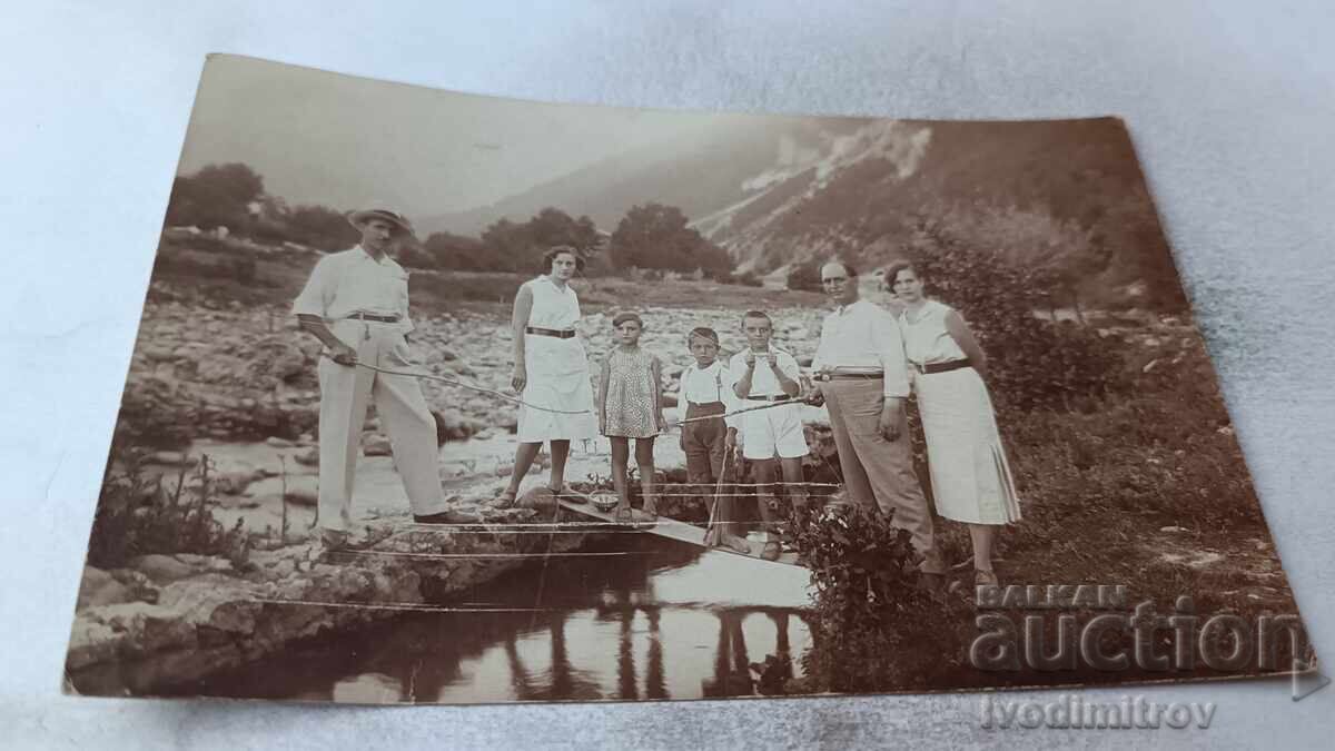 Photograph Etropole Men women and children in the riverbed 1932