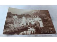 Photograph Etropole Men women and children in the riverbed 1932