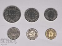 O mulțime de monede din Elveția