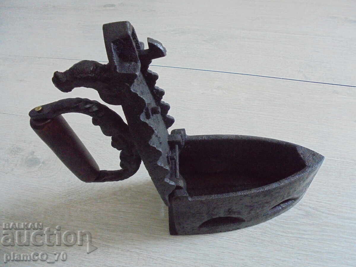 Auction  Antique charcoal iron