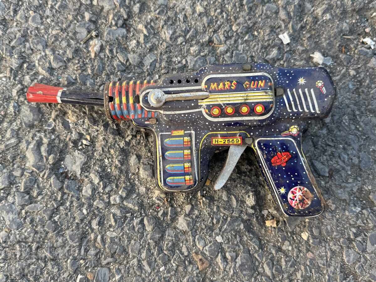 Old metal mechanical toy space gun with price 10.00 BGN | € 5.11 Old metal mechanical toy space gun with price 10.00 BGN | € 5.11