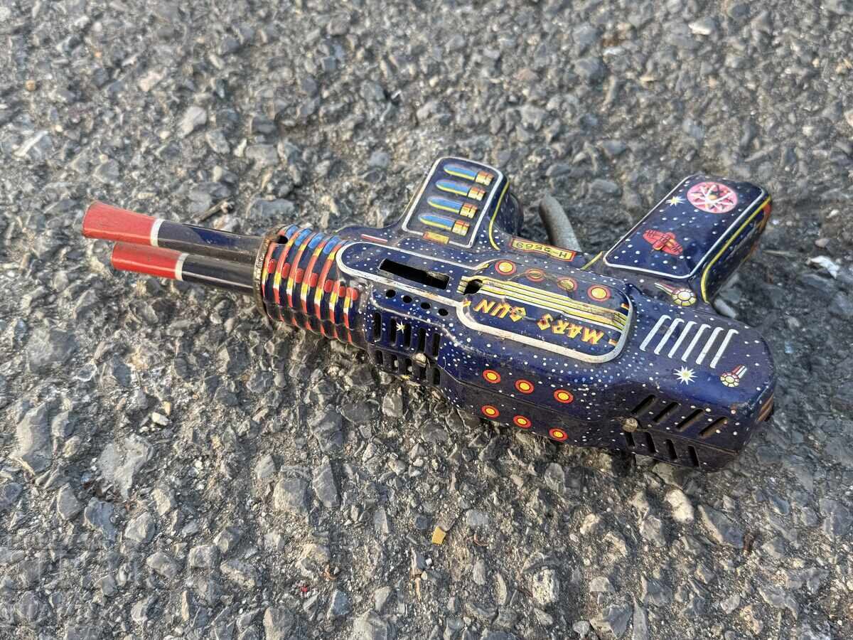 Auction Old metal mechanical toy space gun Auction Old metal mechanical toy space gun