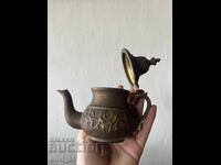 Antique brass jug