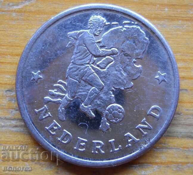 Monedă de fotbal - placă - Olanda - Cupa Mondială 1990 cu preț 5.00 BGN | € 2.56 Monedă de fotbal - placă - Olanda - Cupa Mondială 1990 cu preț 5.00 BGN | € 2.56