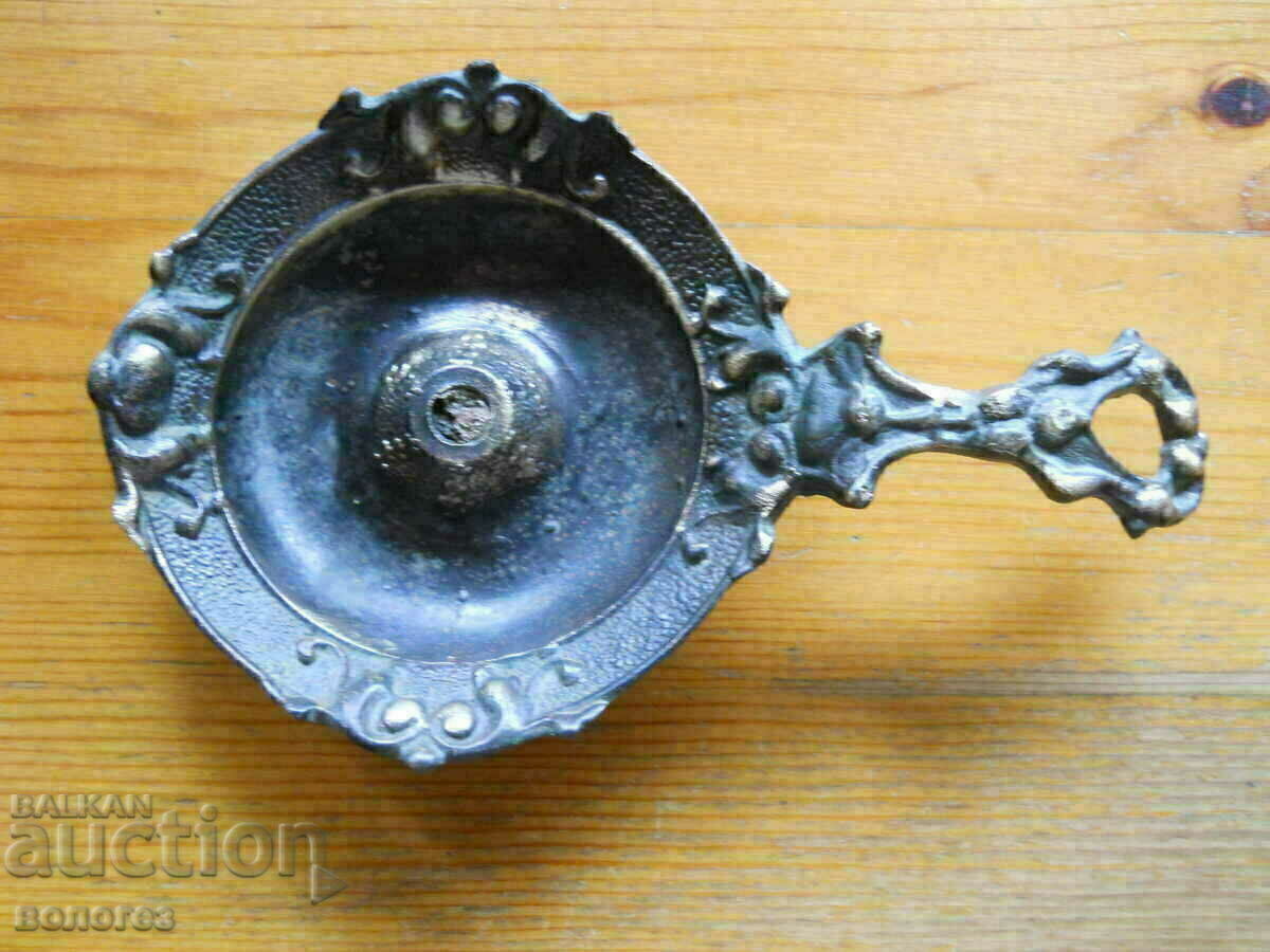 Antique bronze candlestick Antique bronze candlestick