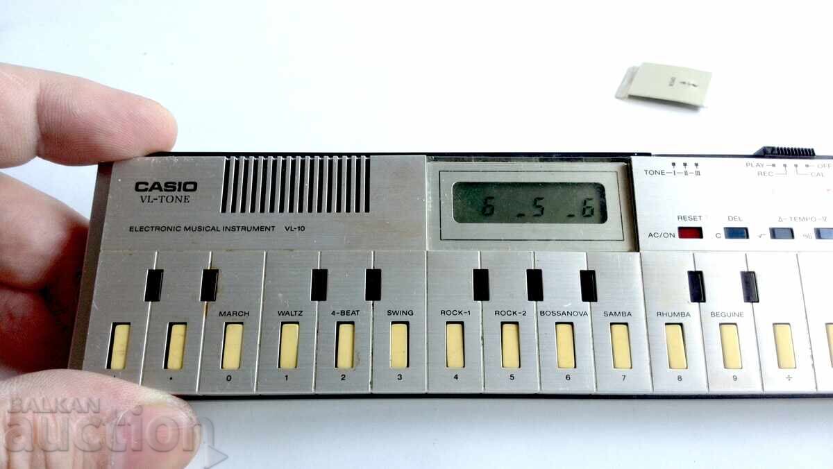 Livrarea CASIO VL-10 gadget vintage din anii '80 - claviatură și calculator Livrarea CASIO VL-10 gadget vintage din anii '80 - claviatură și calculator