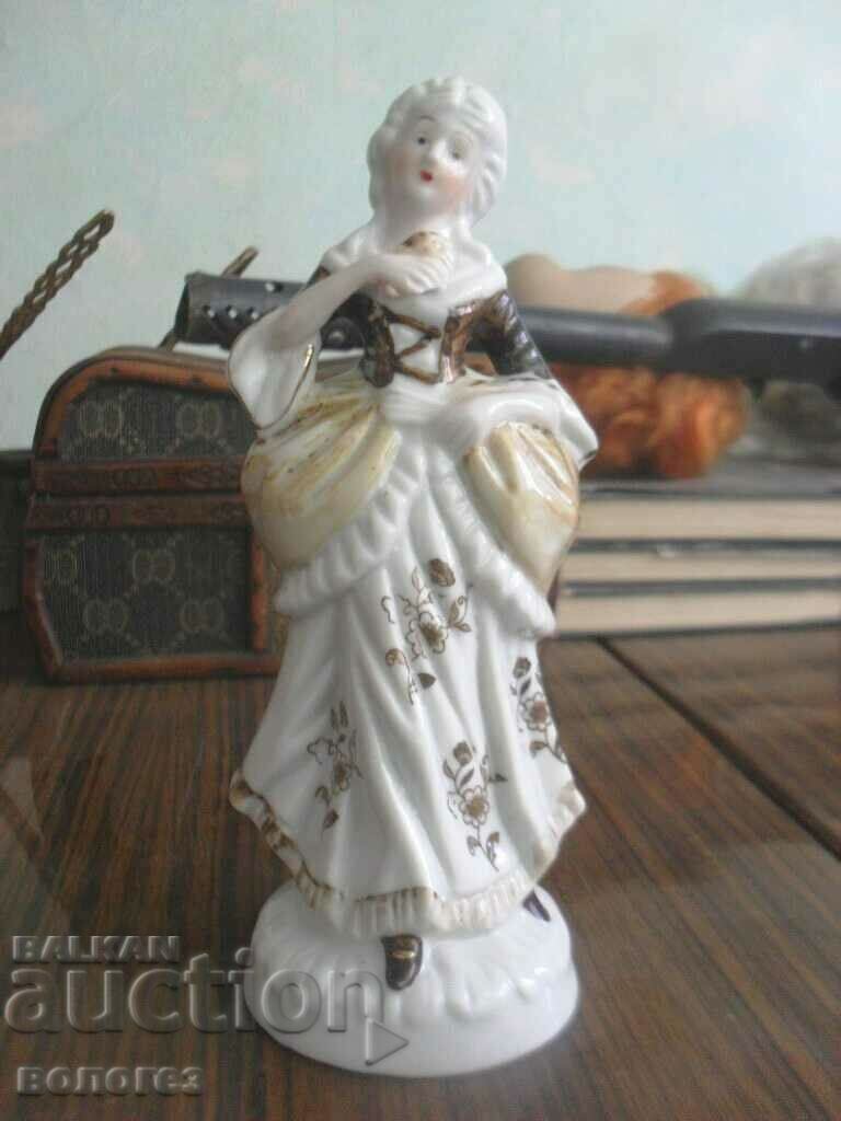 Porcelain figurine Porcelain figurine