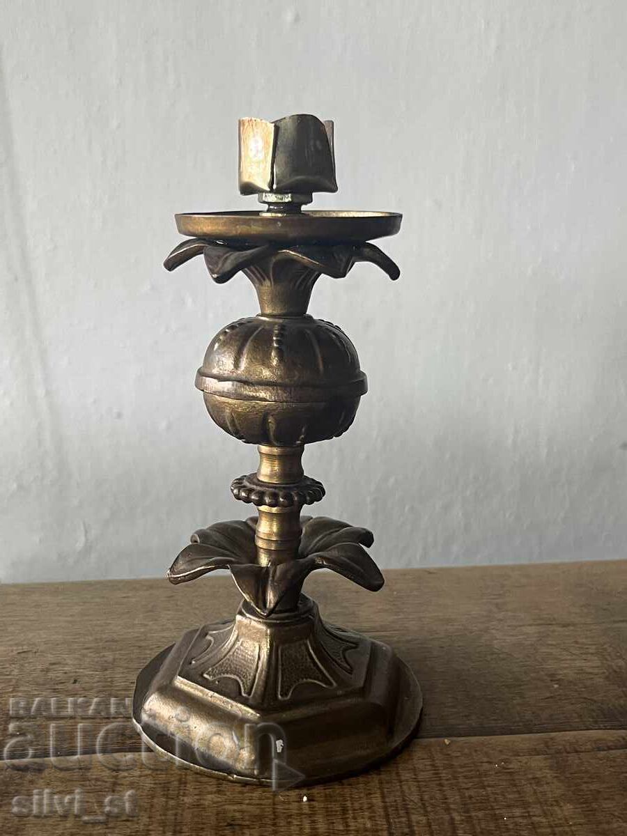 Antique bronze candlestick with price 130.00 BGN | € 66.47 Antique bronze candlestick with price 130.00 BGN | € 66.47