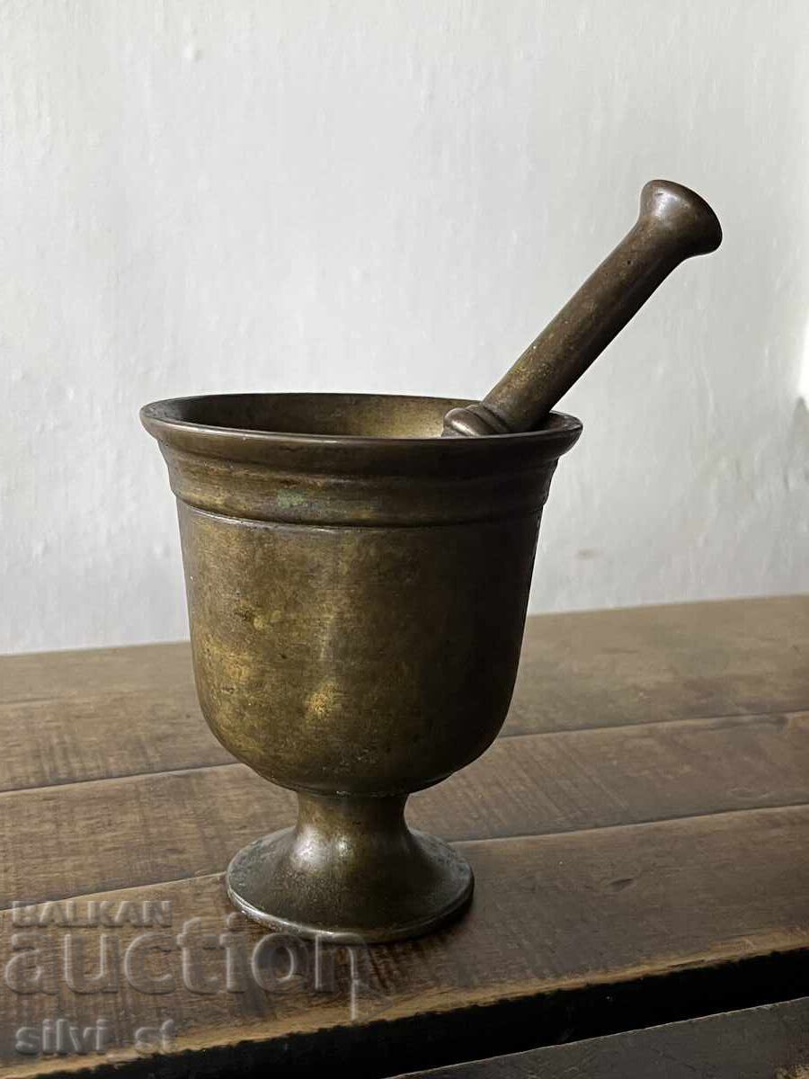 Old bronze mortar and pestle