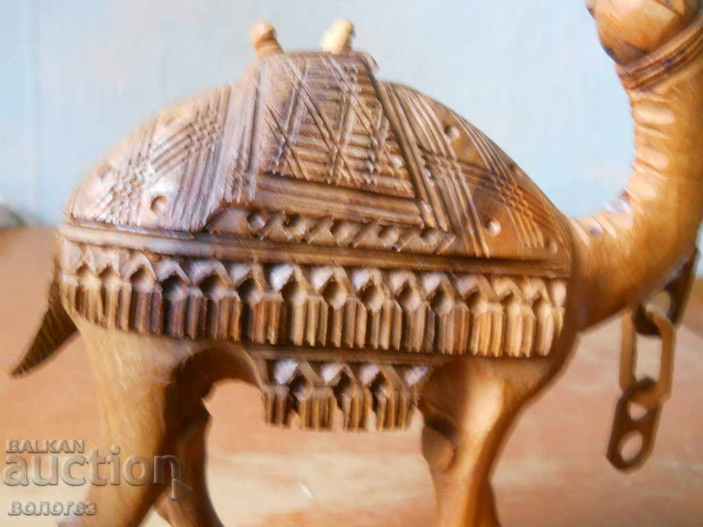 Livrarea Statuetă din lemn sculptată manual - cămilă (Maroc) Livrarea Statuetă din lemn sculptată manual - cămilă (Maroc)