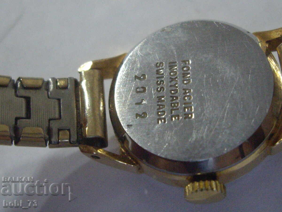 Auction Gold-plated women's watch. Auction Gold-plated women's watch.