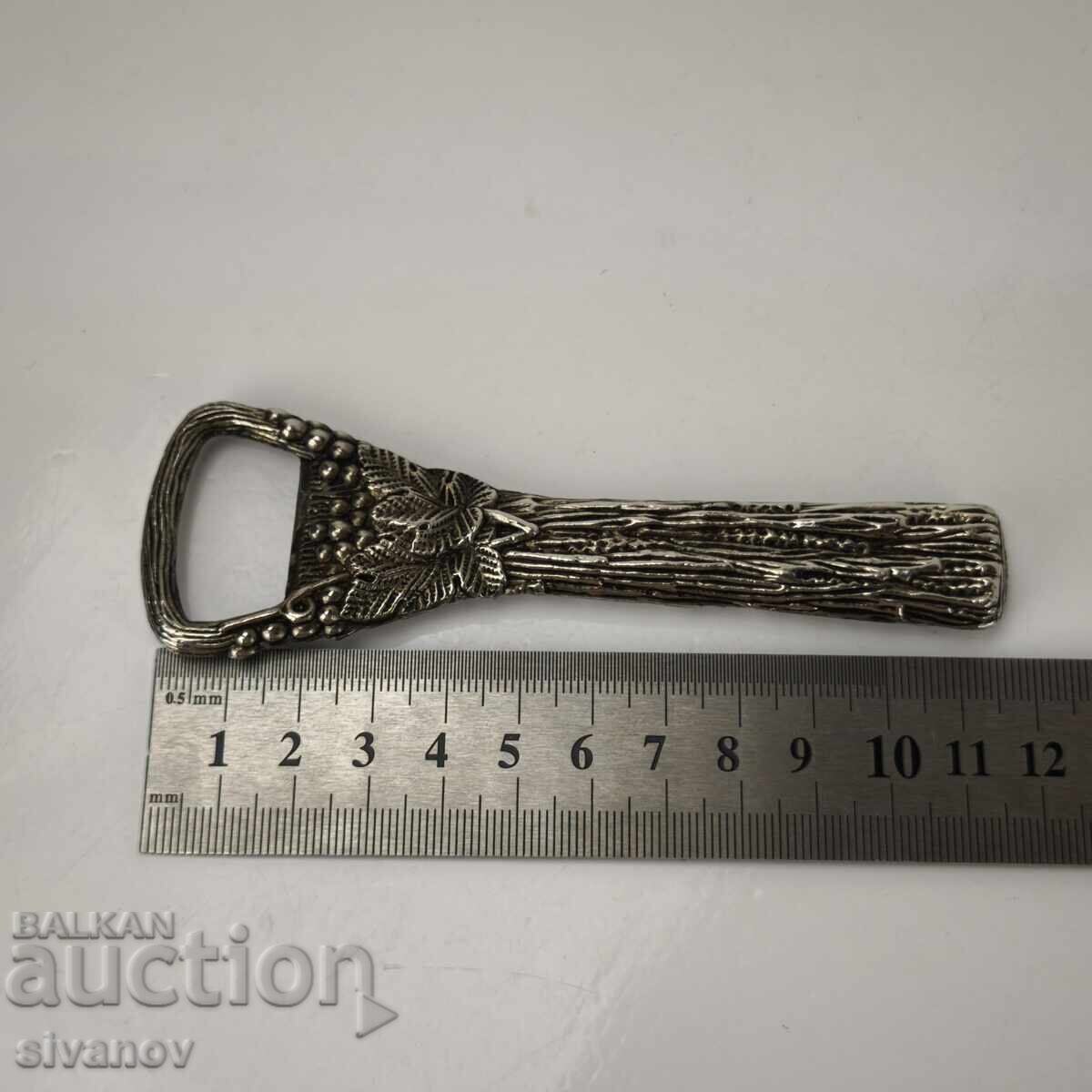 Old metal bottle opener with grape motifs #6151 - 6