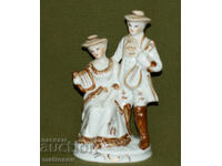 Veche statuetă de porțelan cu un cuplu de muzicanți