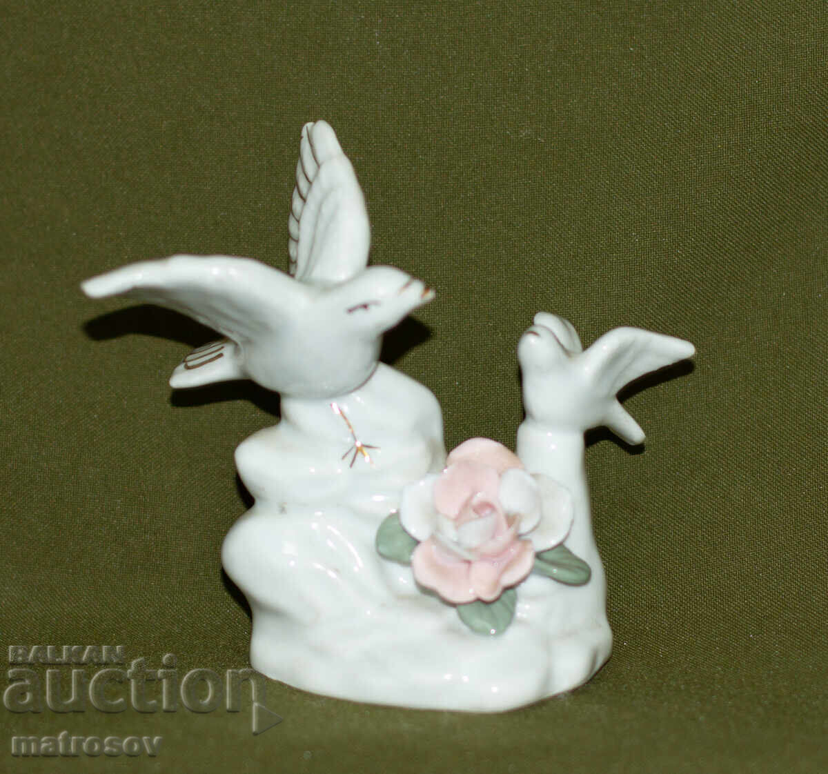 Decorative porcelain bird figurine