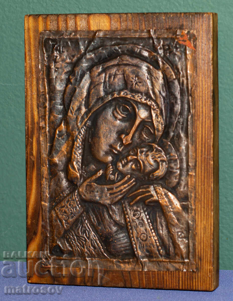 Old copper plaque icon of the Virgin Mary with the Child Old copper plaque icon of the Virgin Mary with the Child