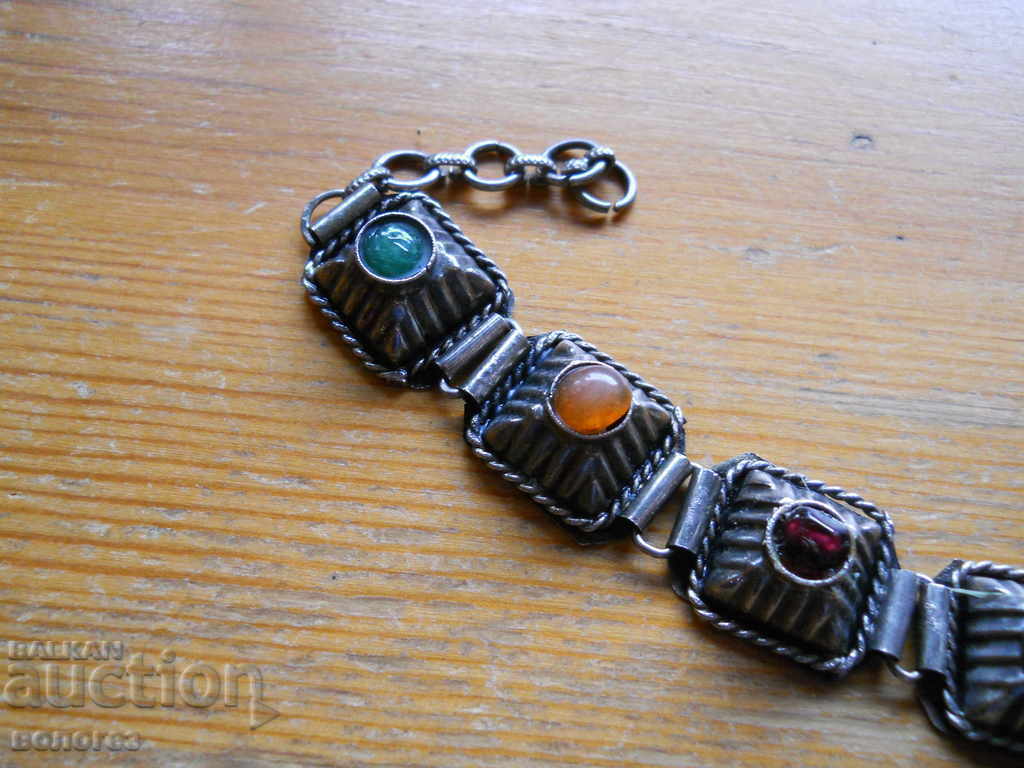 Auction  Old metal bracelet with semi-precious stones