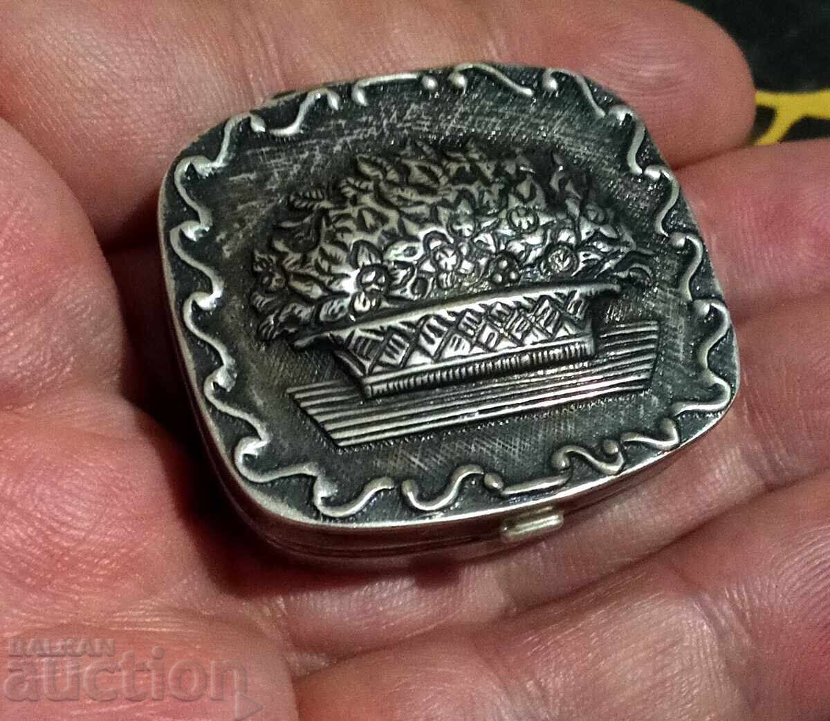 Vintage solid silver pill box with floral decoration