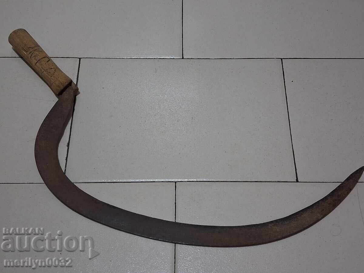 Old scythe, sickle, blade, wrought iron