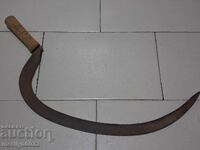 Old scythe, sickle, blade, wrought iron