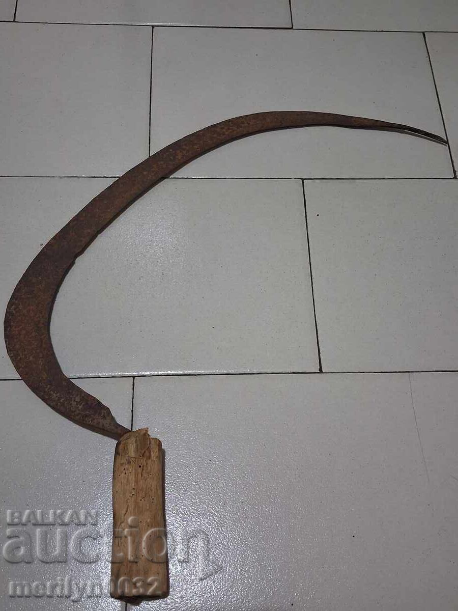 Old scythe, sickle, blade, wrought iron