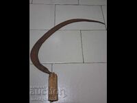Old scythe, sickle, blade, wrought iron