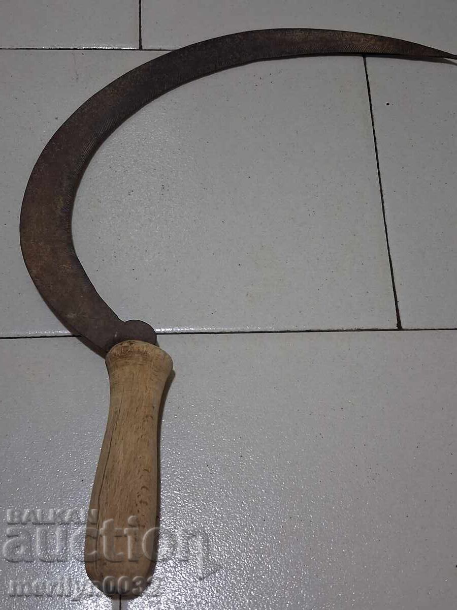 Old scythe, sickle, blade, wrought iron
